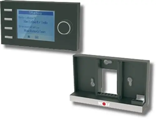 Wandmodul mit LCD-Anzeige und Bedienelementen, auf einem schwarzen Wandsockel montiert. Die Marke Wolf ist am Sockel abgebildet.